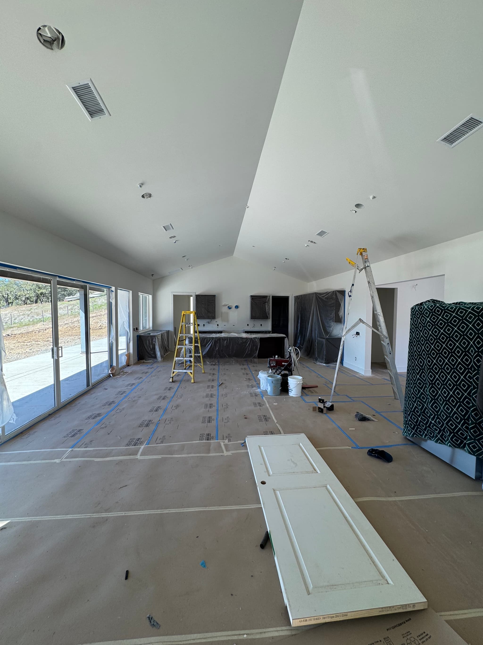 Homeowner reviewing remodel plans at a construction site